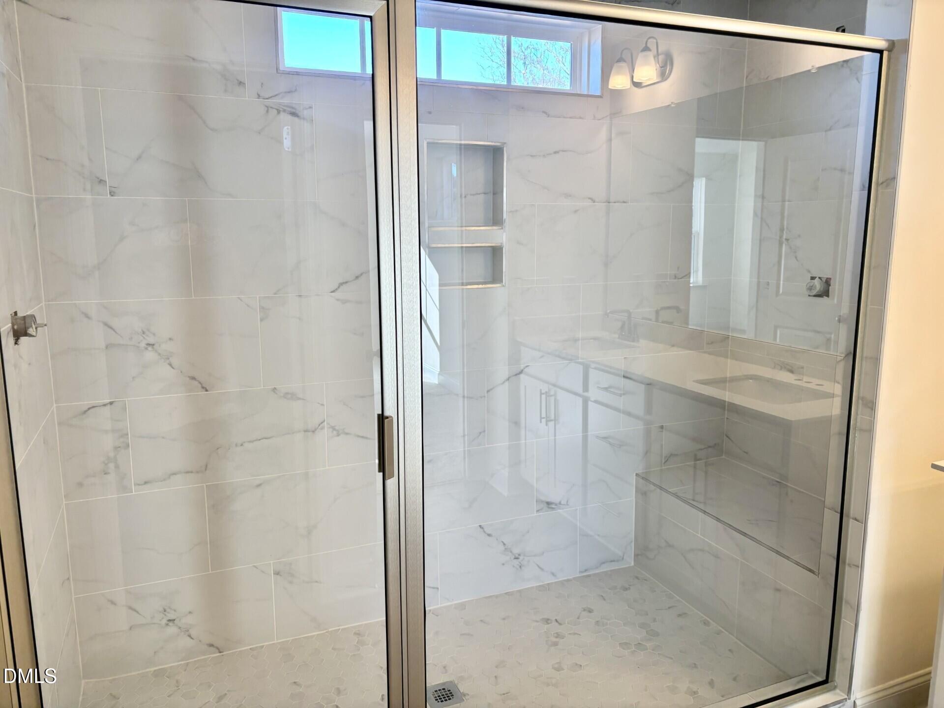 20 Gerrard Street, Unit 6 Franklinton, NC 27525 - Photo 27 of 31 a bathroom with a glass shower door