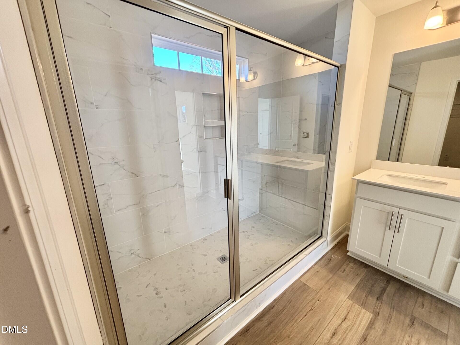 20 Gerrard Street, Unit 6 Franklinton, NC 27525 - Photo 28 of 31 a bathroom with a shower and a mirror