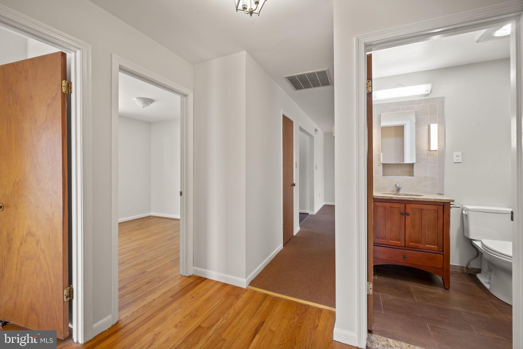 8604 Imperial Drive Laurel, MD 20708 - Photo 28 of 50 Main level hallway