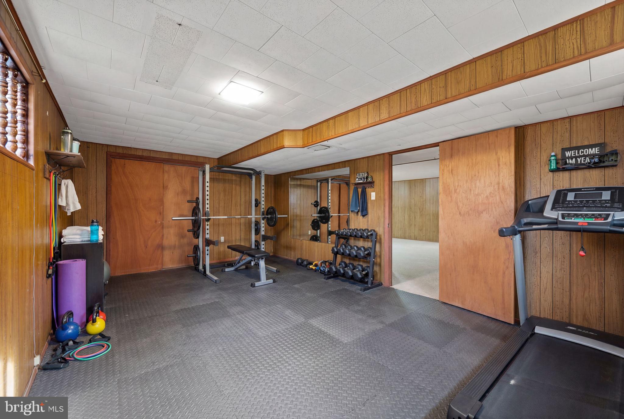 8604 Imperial Drive Laurel, MD 20708 - Photo 35 of 50 Lower level gym/office staged