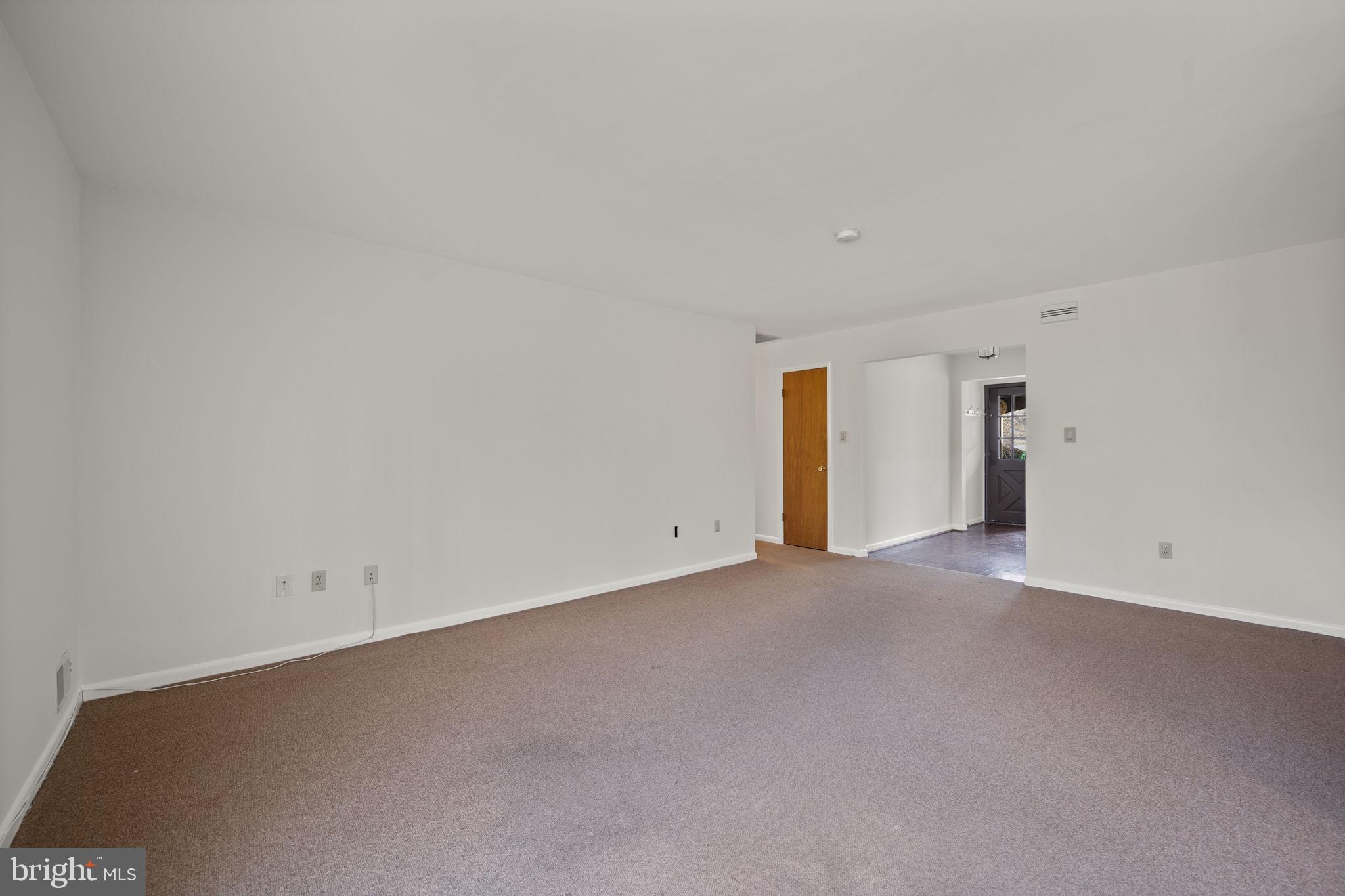 8604 Imperial Drive Laurel, MD 20708 - Photo 6 of 50 Living looking out towards front door