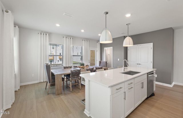 a kitchen with counter space cabinets and appliances