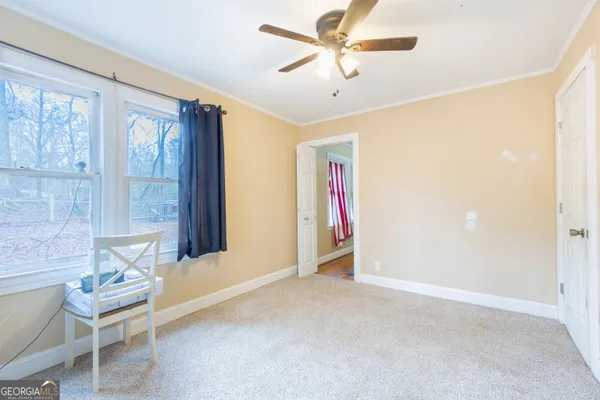 a view of livingroom with furniture and window