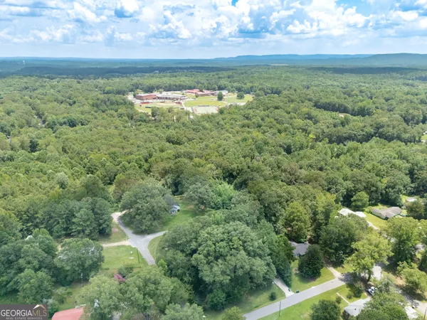 a view of a lake with a yard