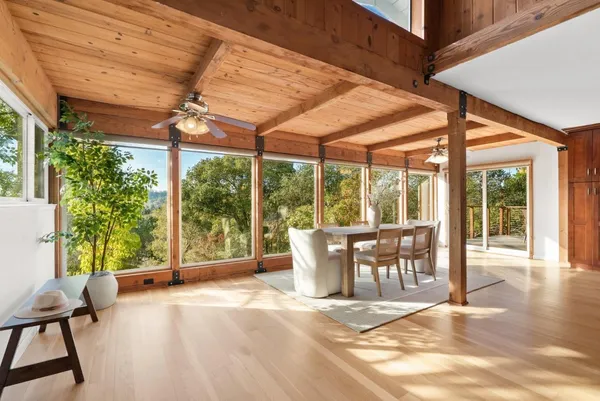 a patio outdoor space with furniture and garden view