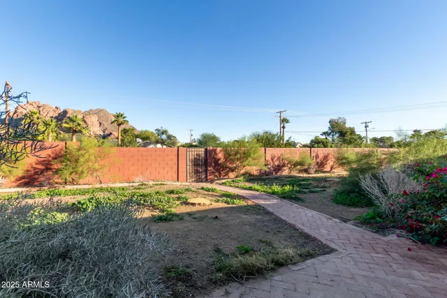 a view of a house with a street
