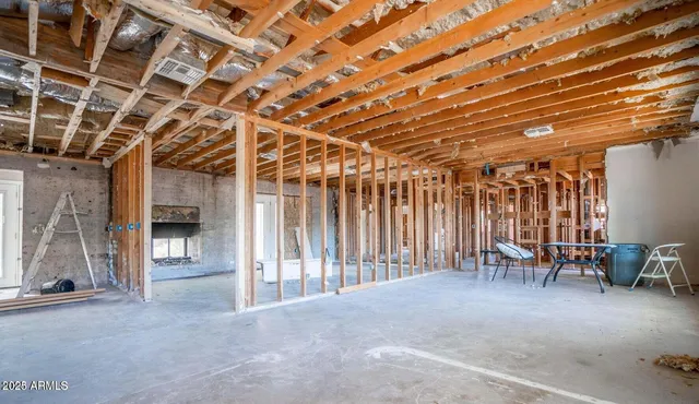 a view of balcony with furniture