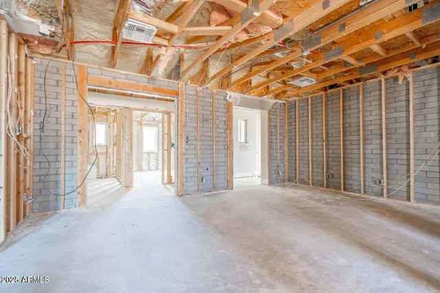 an outdoor space with patio furniture