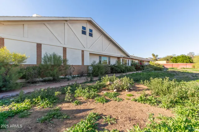 a view of a yard with an outdoor space