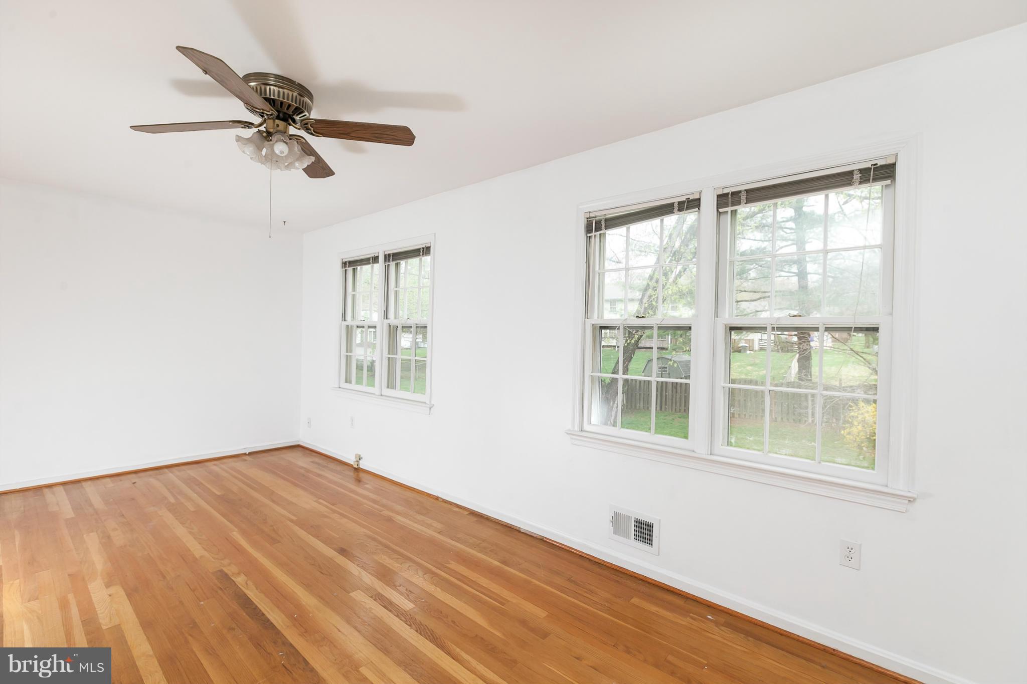 13708 Lockdale Road Silver Spring, MD 20906 - Photo 23 of 30 a view of a room with wooden floor and a window