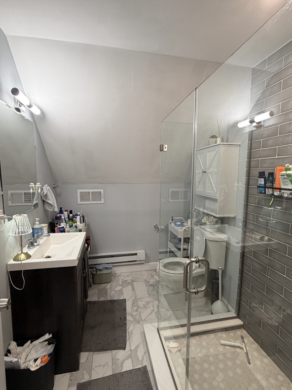 562 East 7th Street, Unit 2 Boston, MA 02127 - Photo 16 of 18 a bathroom with a double vanity sink and a mirror