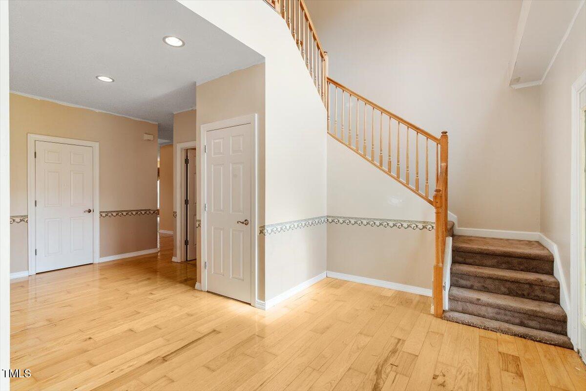 1175 Faulkner Town Road Henderson, NC 27537 - Photo 11 of 48 a view of entryway with wooden floor and stairs