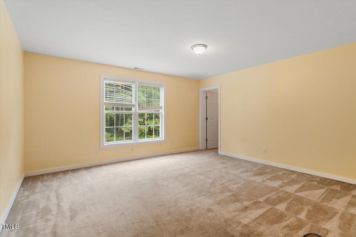 1175 Faulkner Town Road Henderson, NC 27537 - Photo 40 of 48 an empty room with windows