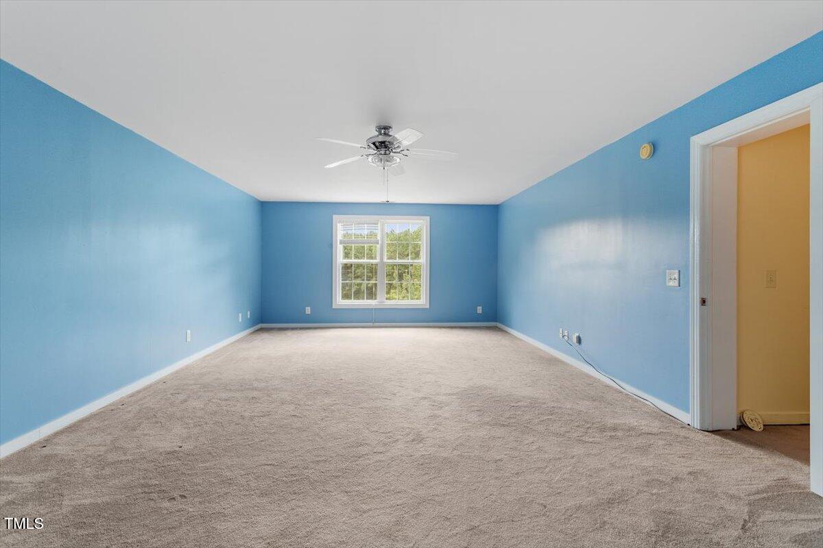 1175 Faulkner Town Road Henderson, NC 27537 - Photo 42 of 48 a view of an empty room with a window