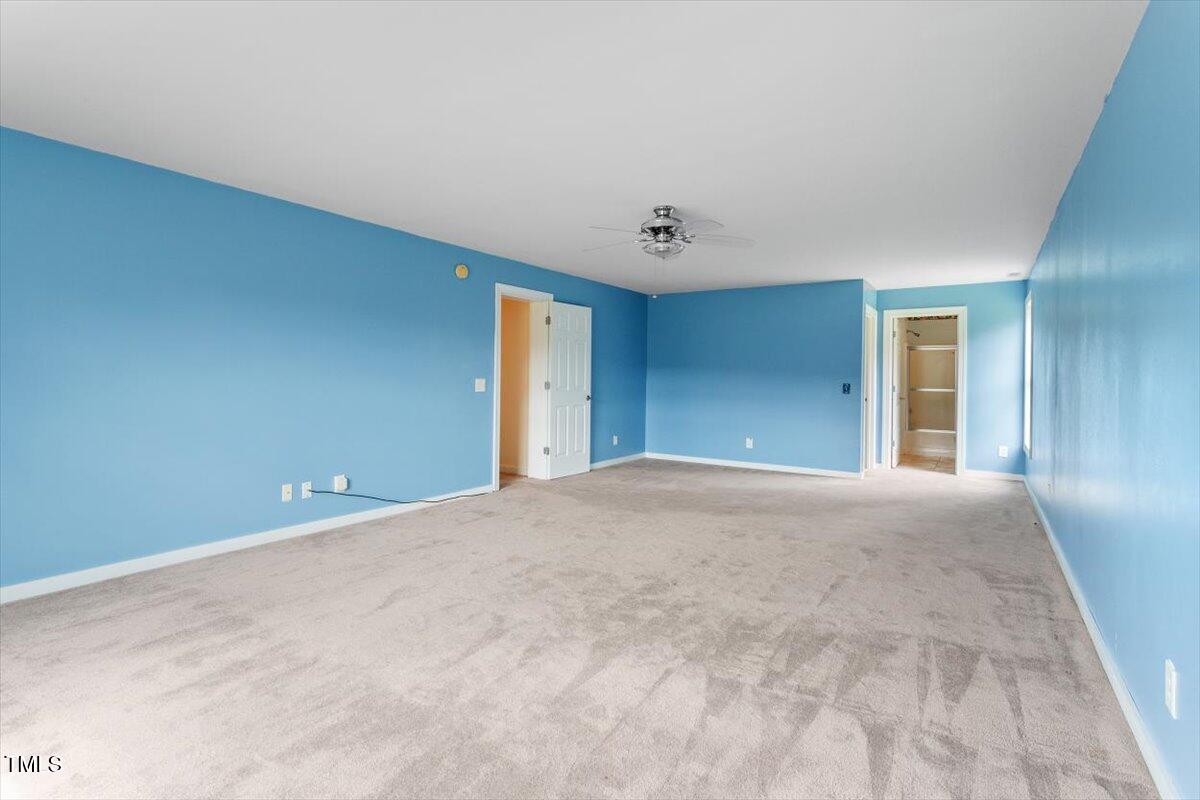 1175 Faulkner Town Road Henderson, NC 27537 - Photo 45 of 48 a view of an empty room with a window