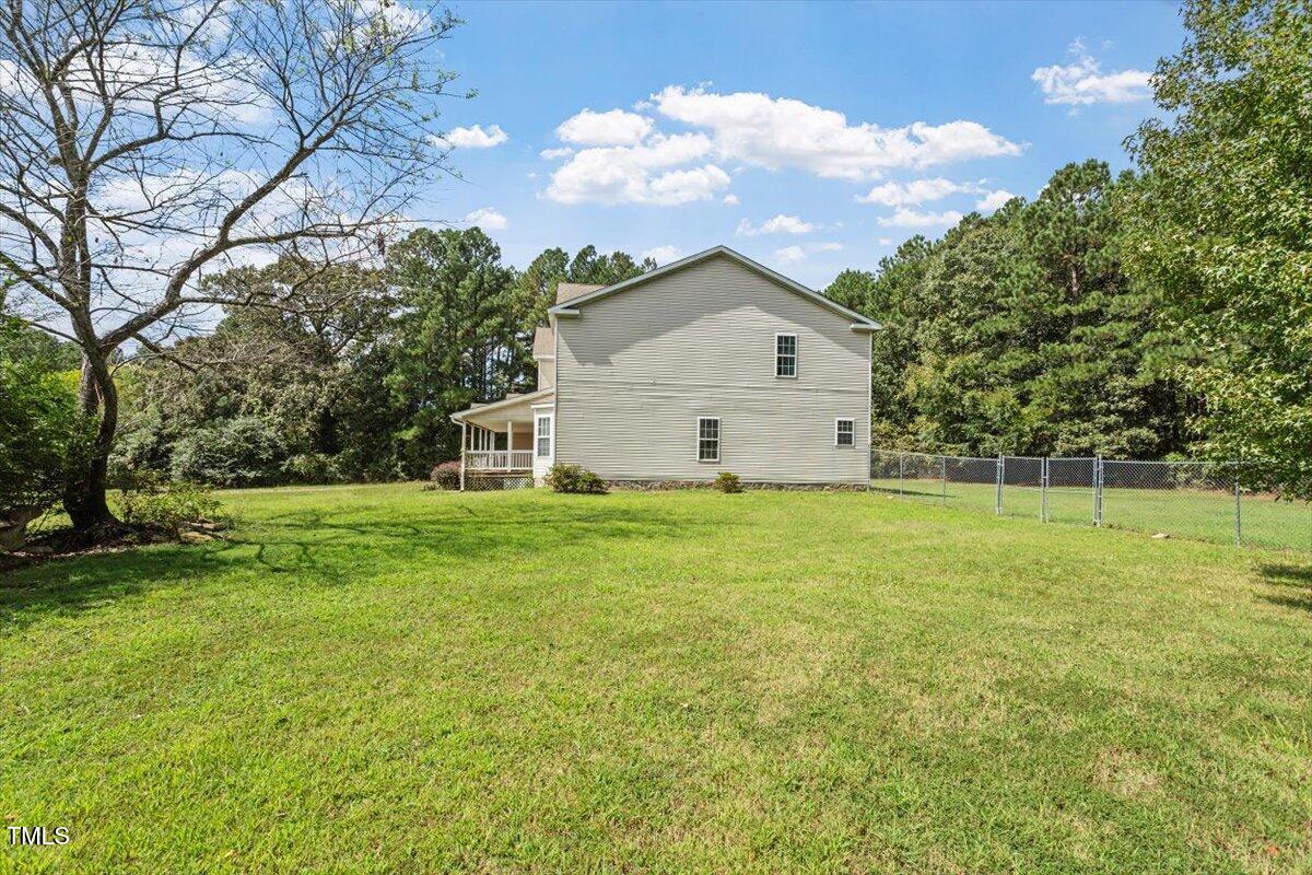1175 Faulkner Town Road Henderson, NC 27537 - Photo 5 of 48 a view of a house with a yard