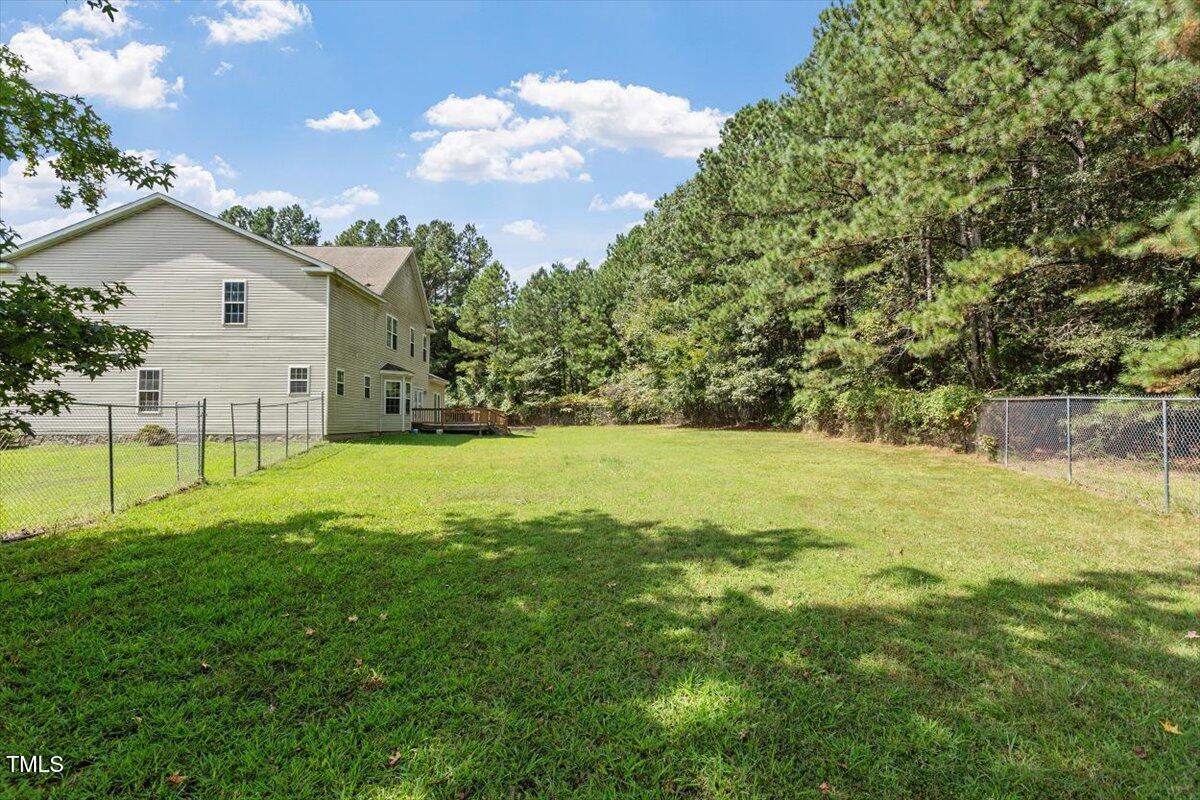 1175 Faulkner Town Road Henderson, NC 27537 - Photo 6 of 48 a view of backyard with swimming pool and patio