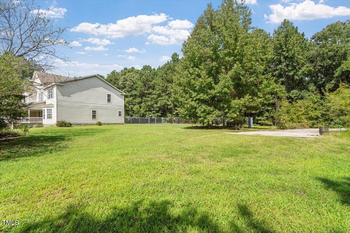 1175 Faulkner Town Road Henderson, NC 27537 - Photo 7 of 48 a view of a house with a yard