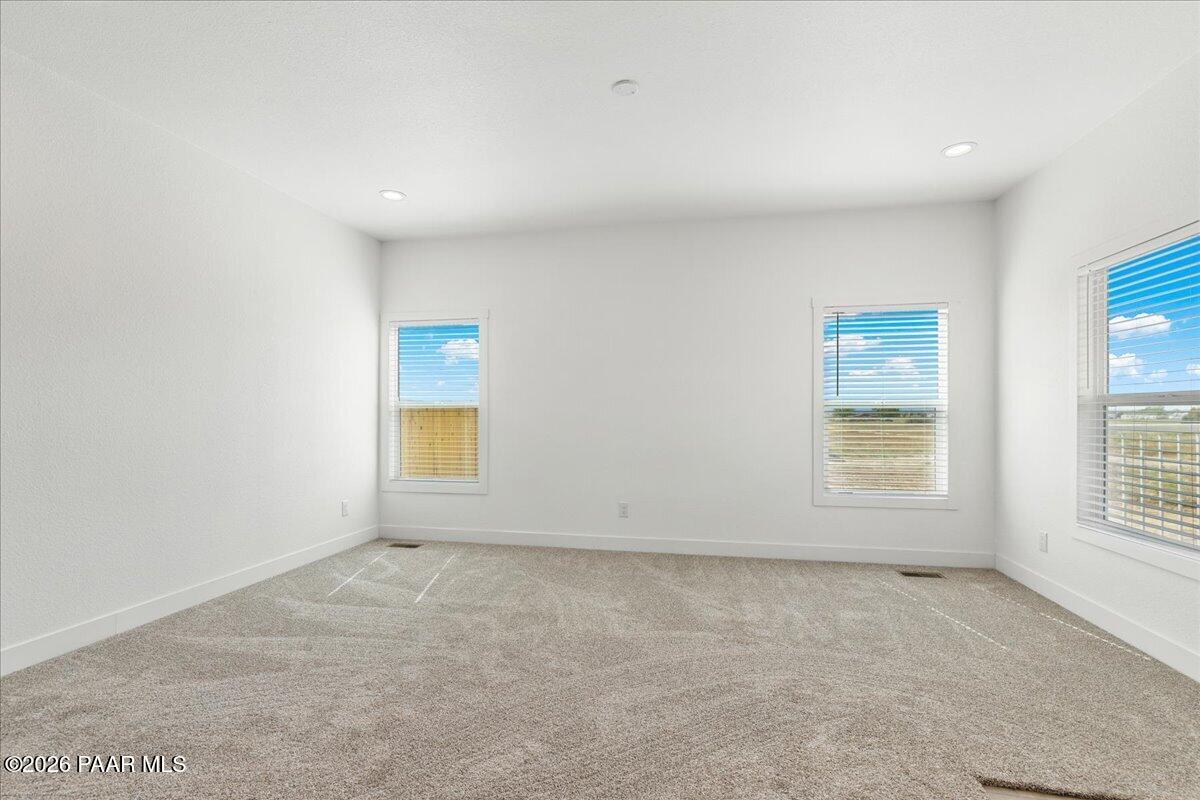 65 Hawaii Road Paulden, AZ 86334 - Photo 9 of 29 an empty room with a window