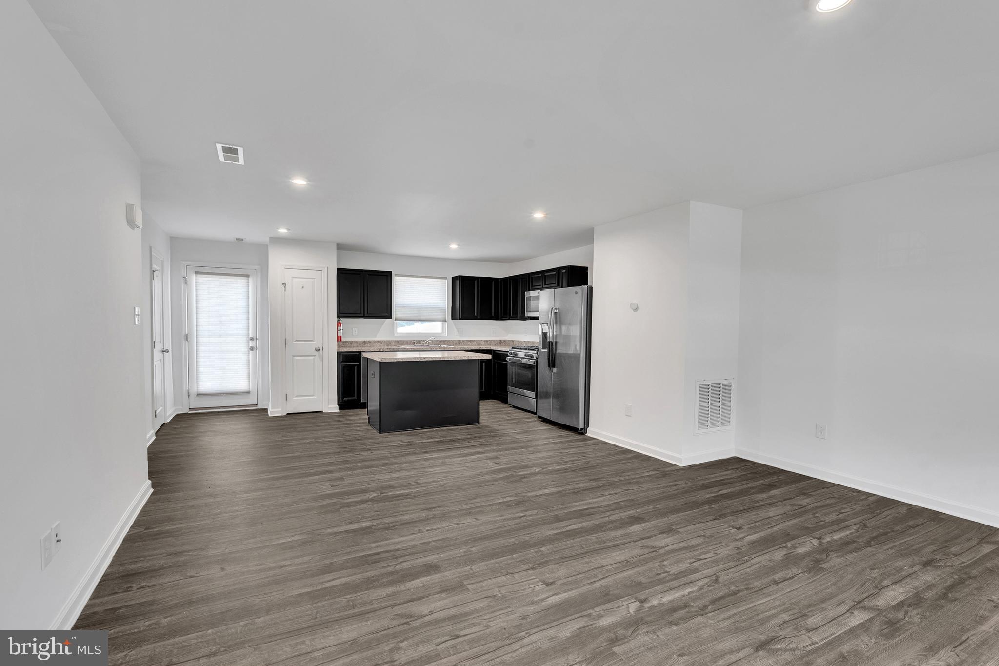 144 Ciseley Drive Sicklerville, NJ 08081 - Photo 16 of 48 a view of kitchen with granite countertop cabinets and white appliances