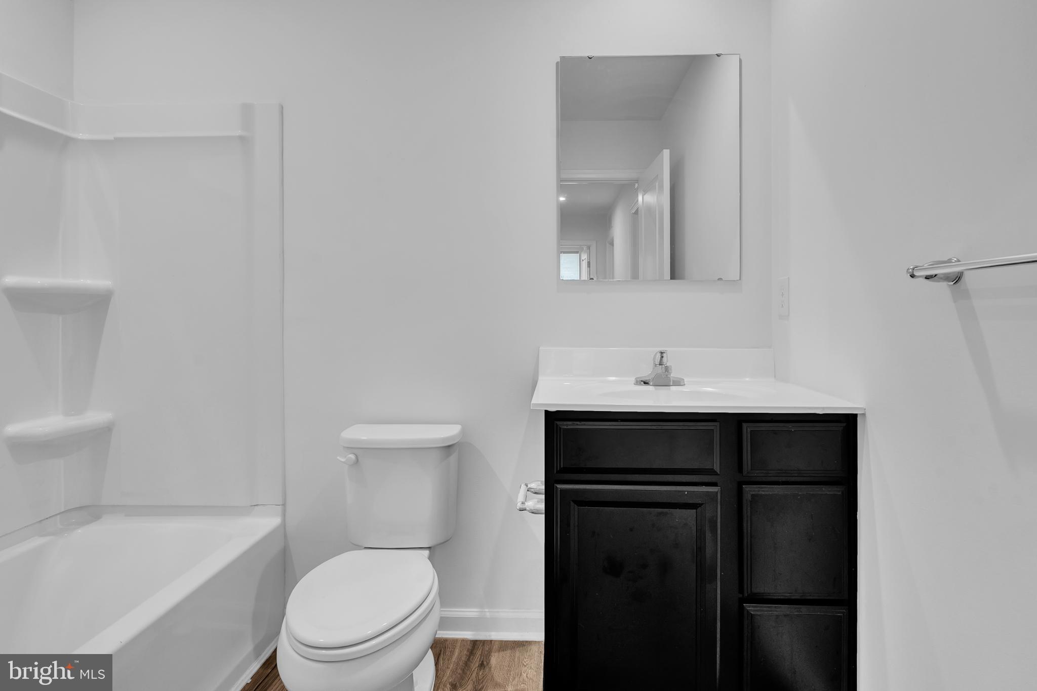 144 Ciseley Drive Sicklerville, NJ 08081 - Photo 32 of 48 a bathroom with a sink toilet and shower