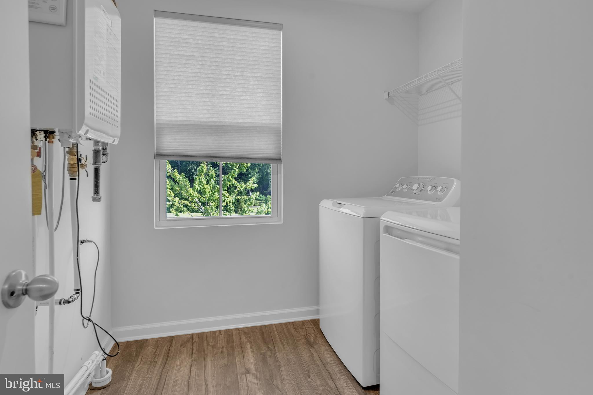 144 Ciseley Drive Sicklerville, NJ 08081 - Photo 38 of 48 a utility room with dryer and washer