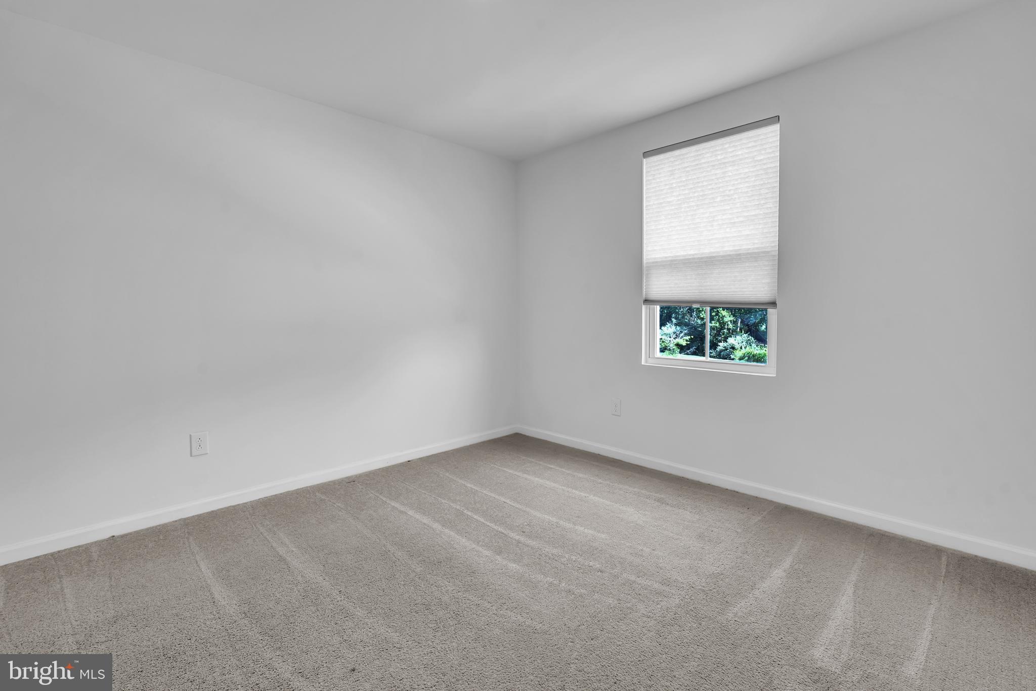 144 Ciseley Drive Sicklerville, NJ 08081 - Photo 41 of 48 an empty room with a window