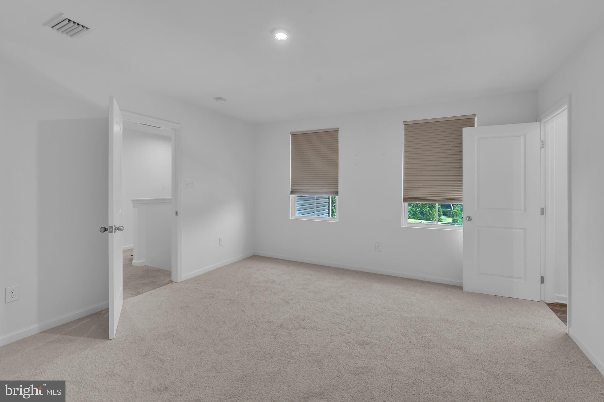 144 Ciseley Drive Sicklerville, NJ 08081 - Photo 48 of 48 a view of an empty room with windows