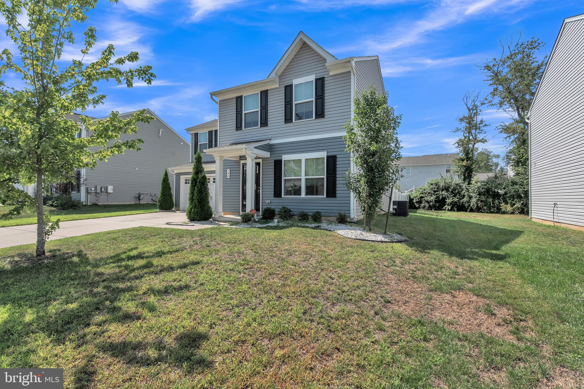 144 Ciseley Drive Sicklerville, NJ 08081 - Photo 5 of 48 a front view of a house with garden