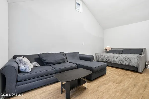 a living room with couches and a couch