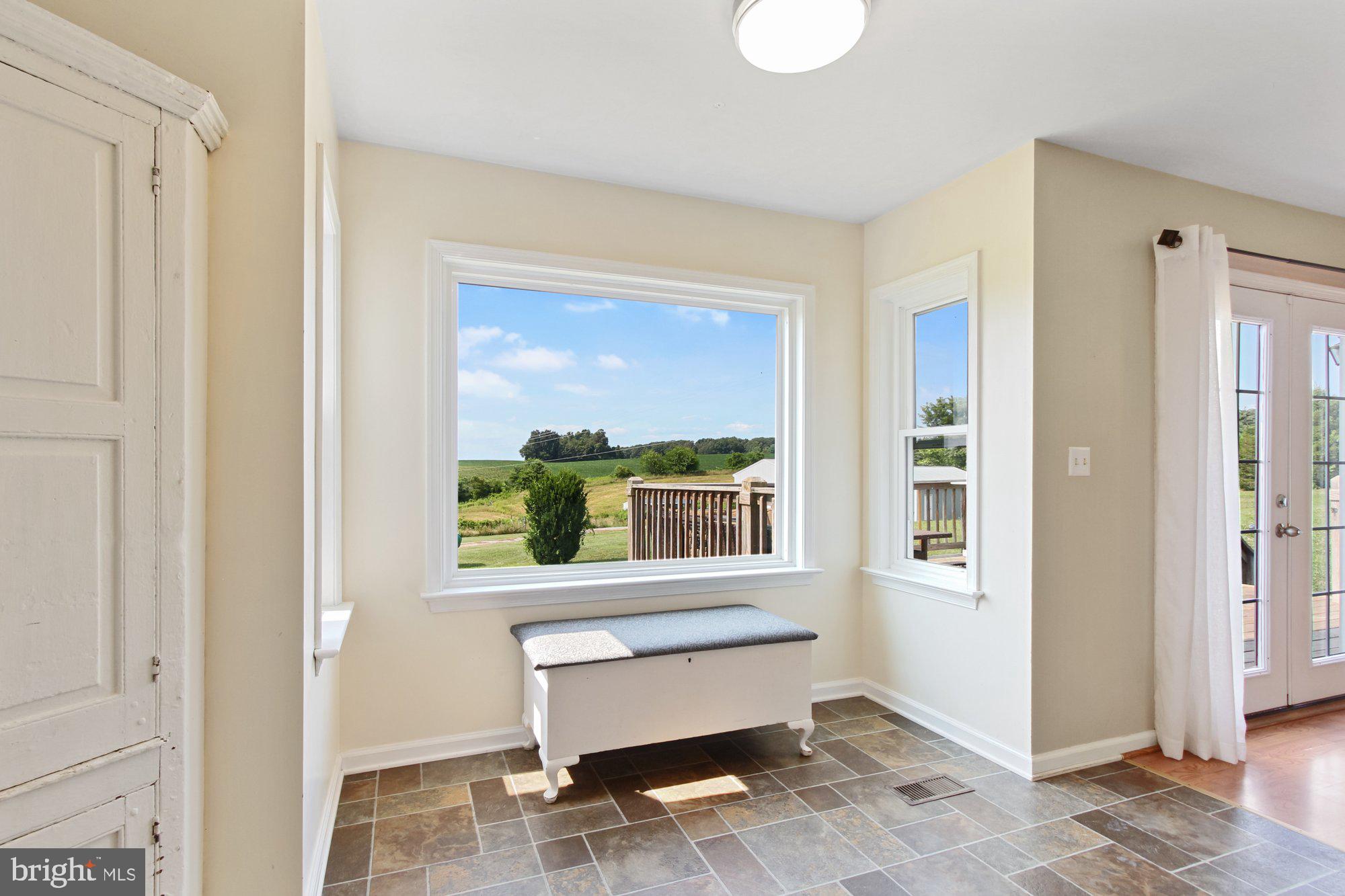 237 Woolen Mill Road New Park, PA 17352 - Photo 8 of 32 Tile flooring and new windows throughout