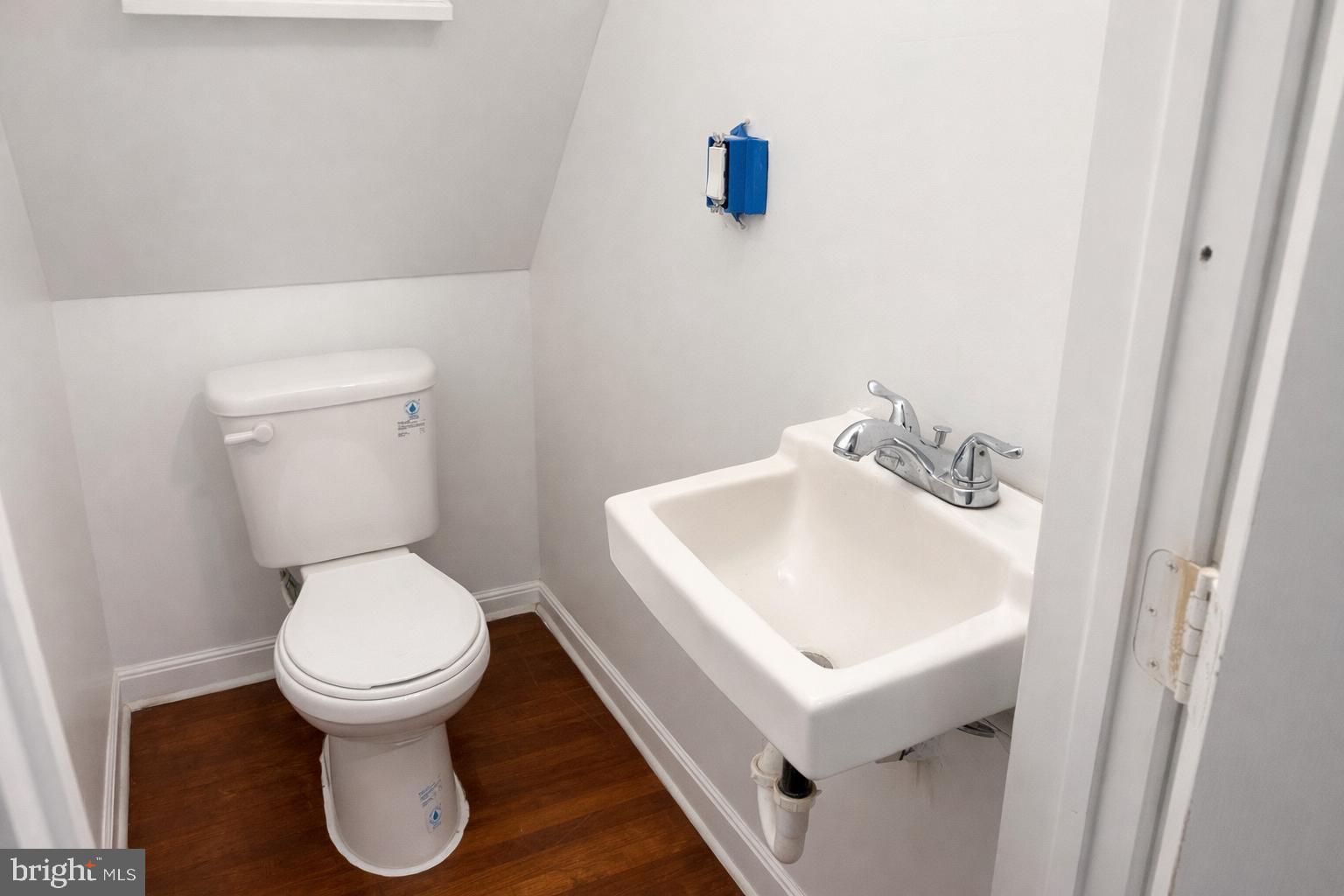 4548 North 17th Street Philadelphia, PA 19140 - Photo 5 of 13 a white toilet sitting next to a white sink