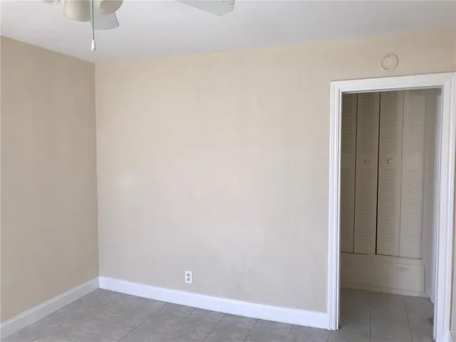 an empty room with a hallway