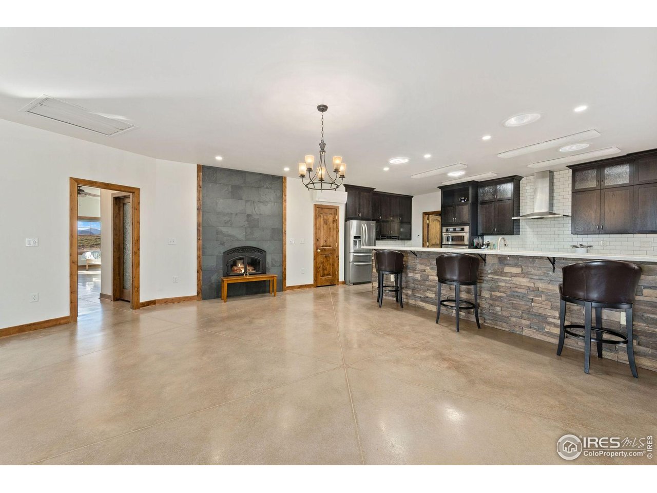 202 Roundtree Road Livermore, CO 80536 - Photo 15 of 50 Radiant heat cement floors throughout