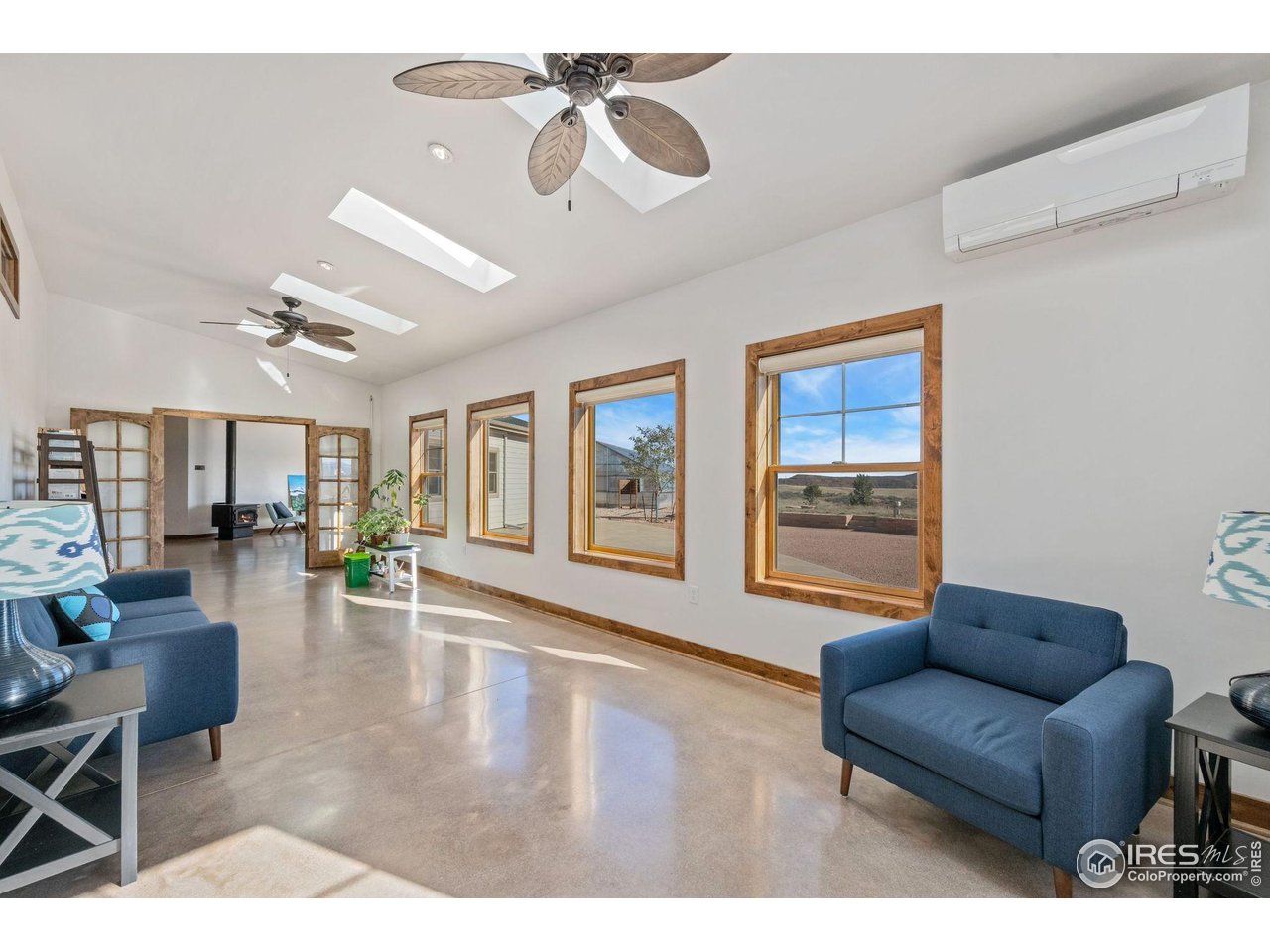 202 Roundtree Road Livermore, CO 80536 - Photo 26 of 50 Bask in the sunlight studio, ready to convert into a yoga/meditation space, extra living area or art studio!