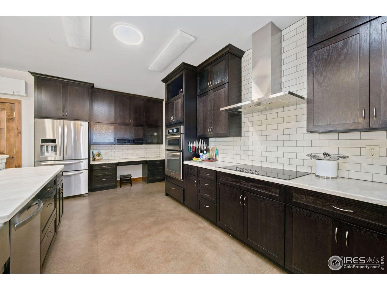202 Roundtree Road Livermore, CO 80536 - Photo 8 of 50 Timeless and Modern kitchen with storage galore