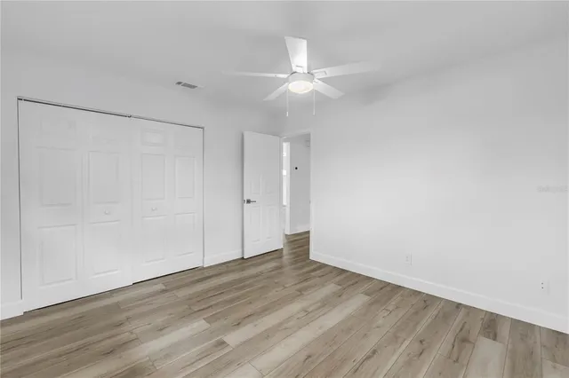 a bathroom with a sink a mirror and a window