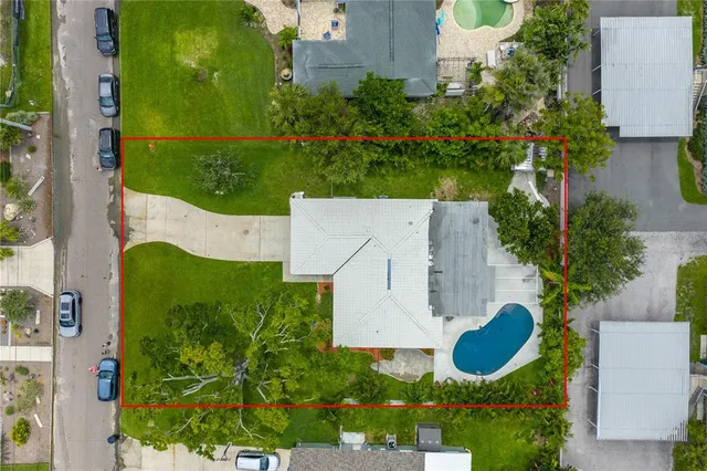 a backyard of a house with lots of green space