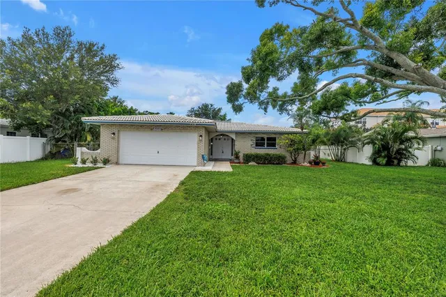 a backyard of a house with seating space
