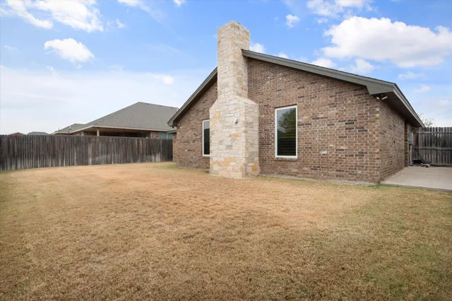a view of wooden floor in front of a house