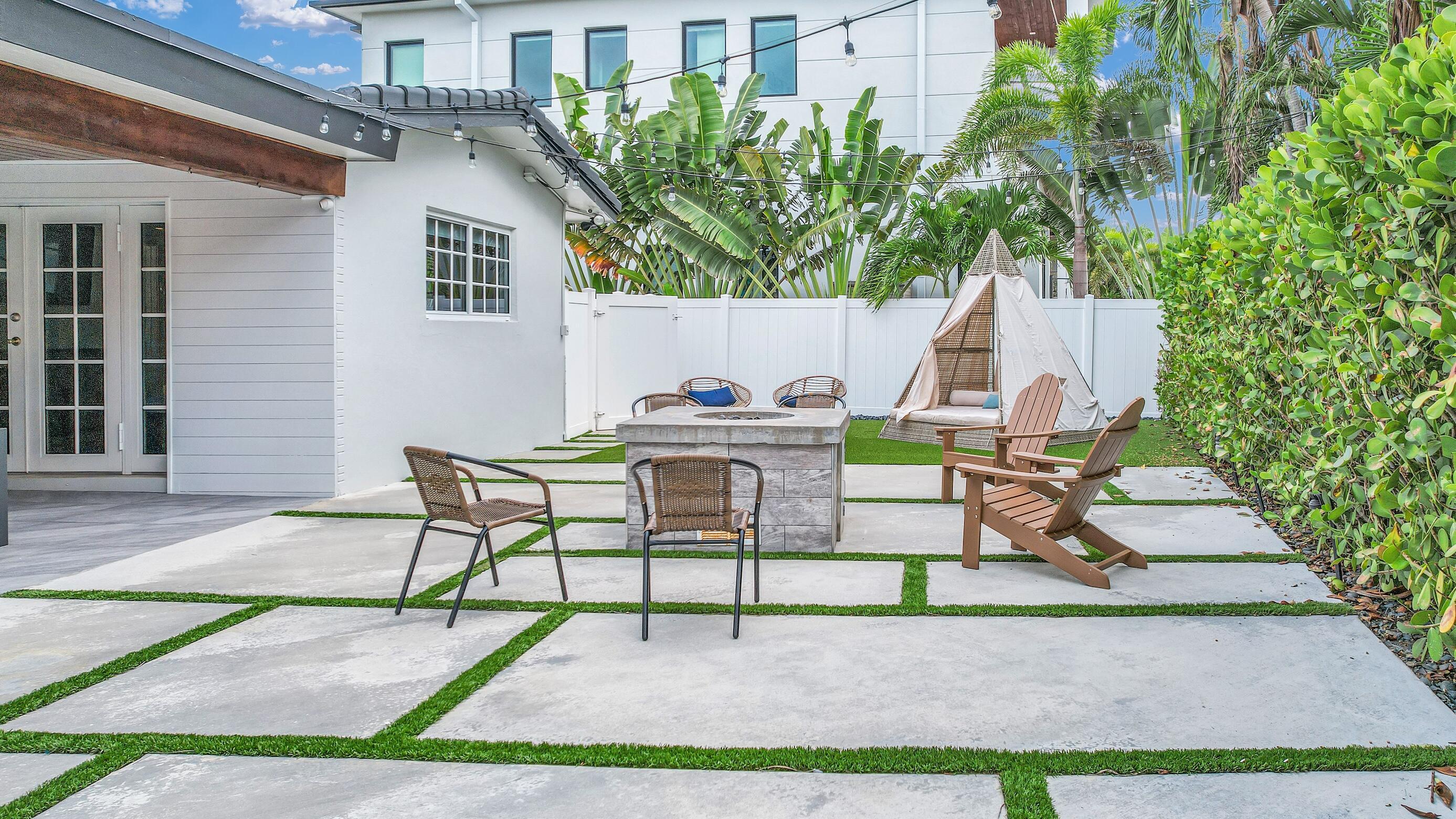 701 Appleby Street Boca Raton, FL 33487 - Photo 23 of 47 a view of backyard with a patio and potted plants