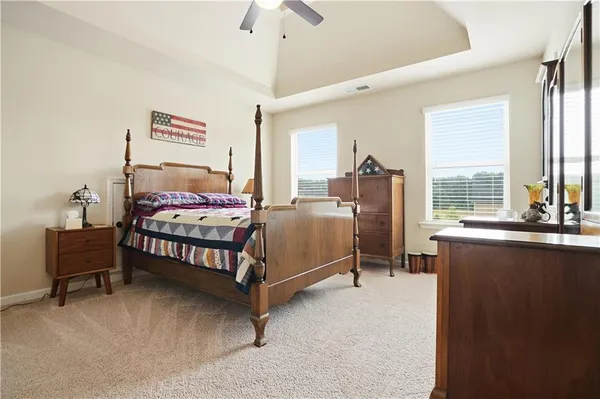 a aerial view of a house with a garden and pool
