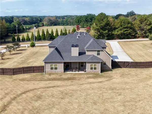 a front view of a house with a ocean view