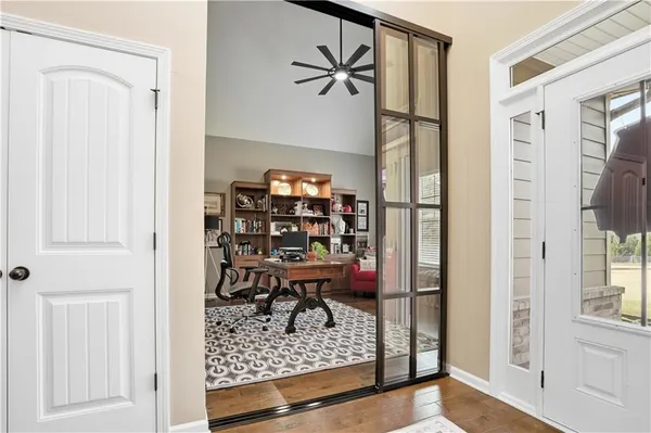 a view of entryway with wooden floor
