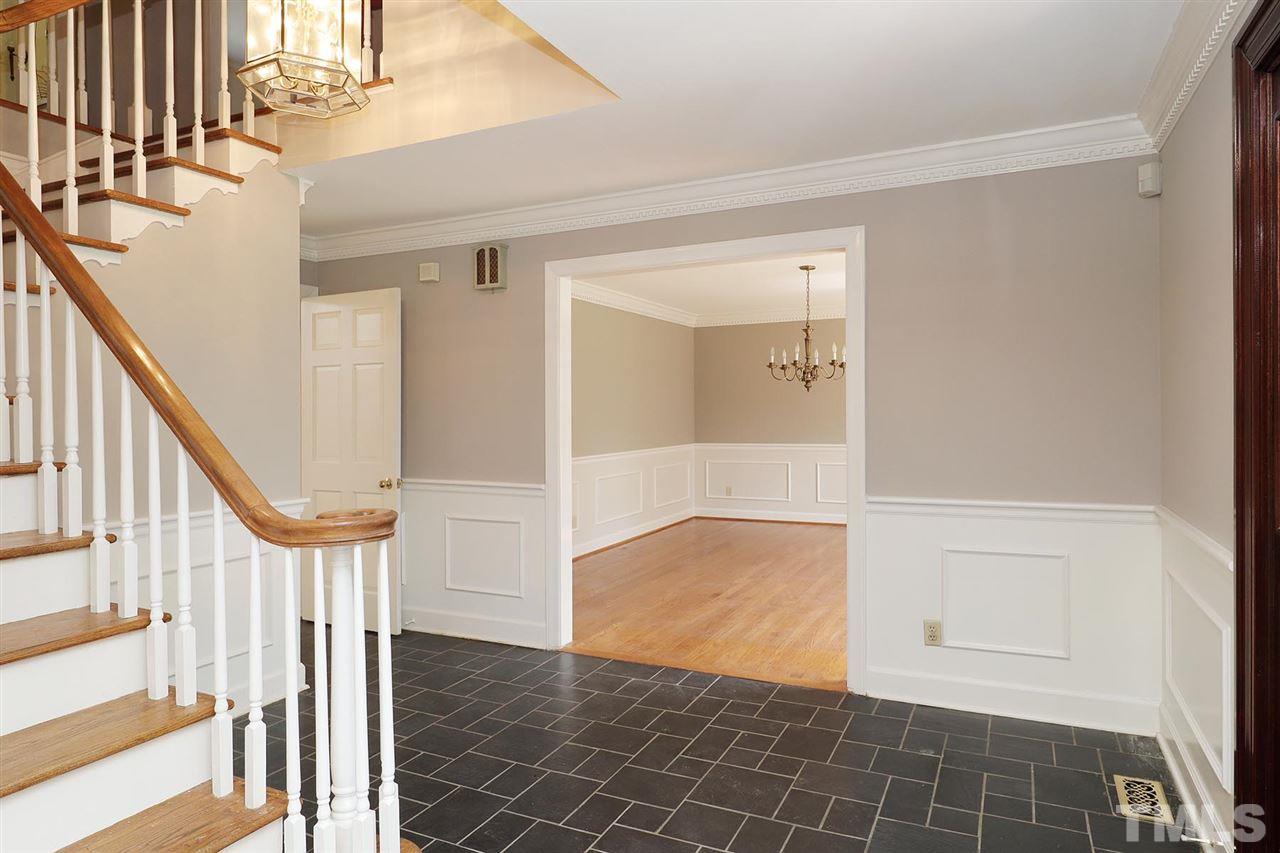 6709 Foxfire Place Raleigh, NC 27615 - Photo 3 of 24 front view of an entryway with wooden floor