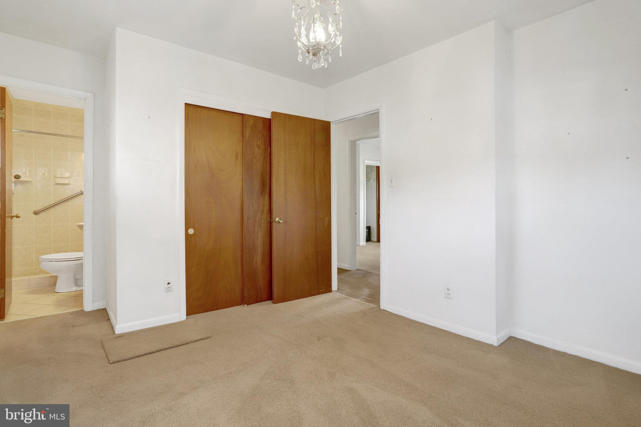 6928 Ruskin Street Springfield, VA 22150 - Photo 11 of 34 a view of a chandelier in a room