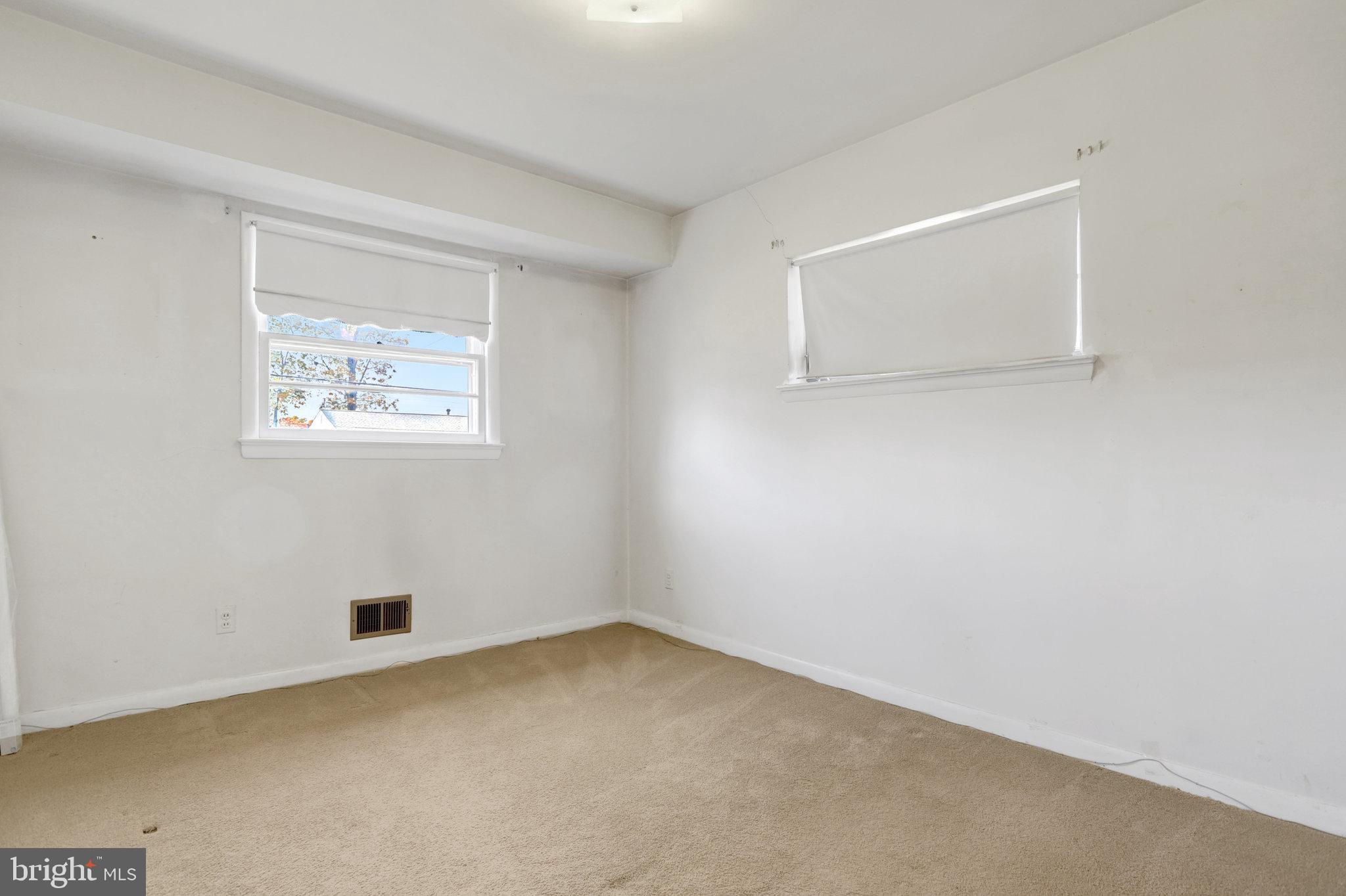 6928 Ruskin Street Springfield, VA 22150 - Photo 15 of 34 an empty room with windows