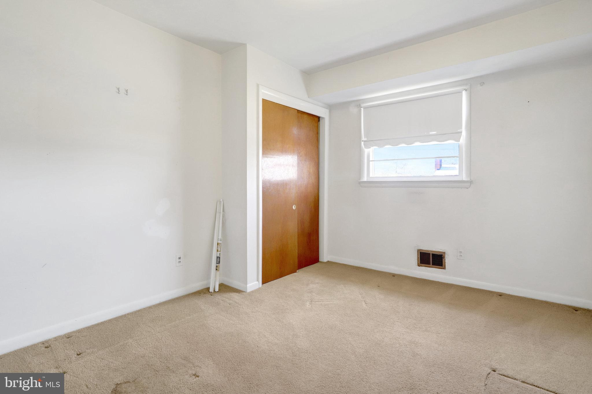 6928 Ruskin Street Springfield, VA 22150 - Photo 17 of 34 an empty room with windows