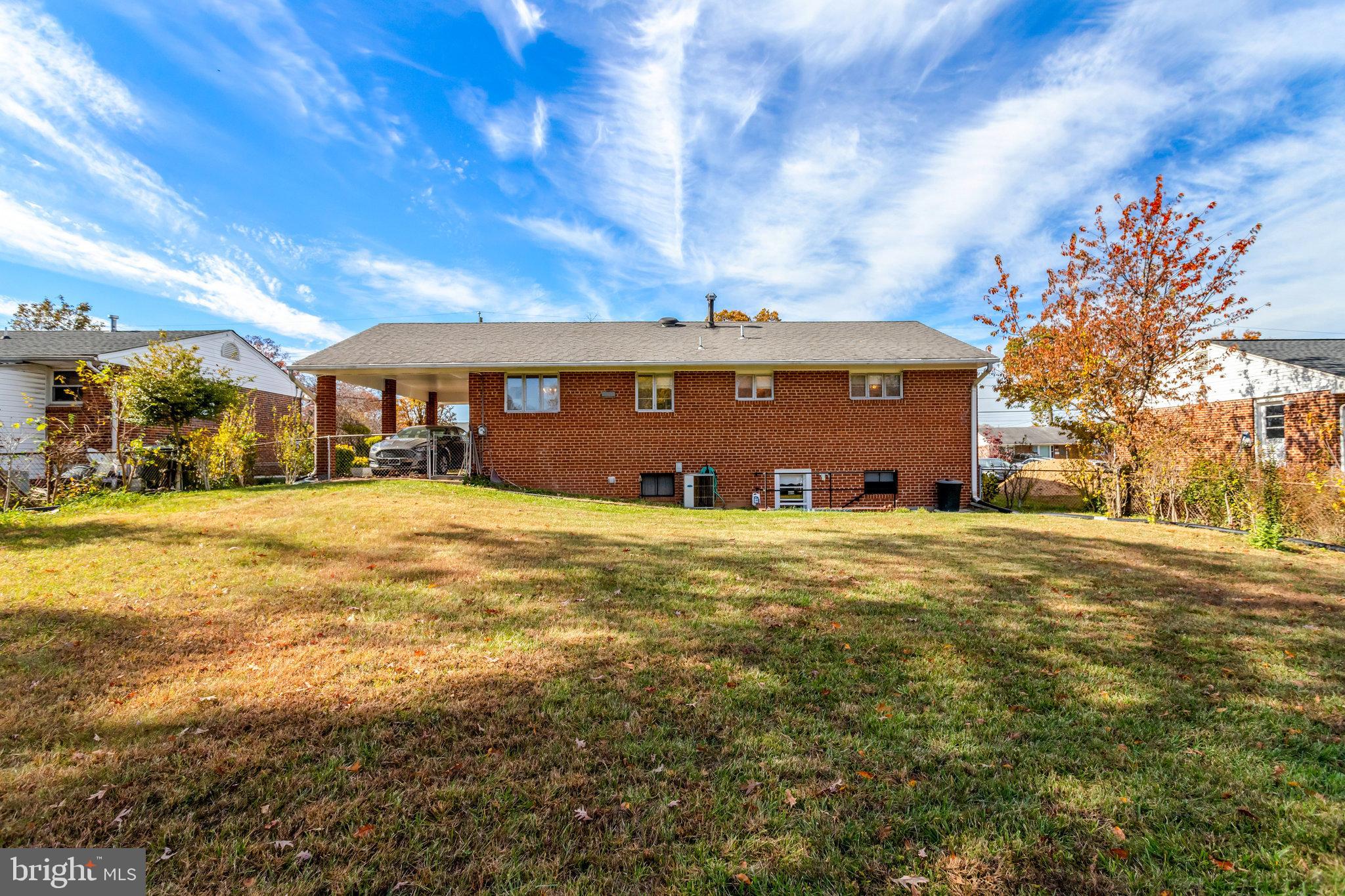 6928 Ruskin Street Springfield, VA 22150 - Photo 33 of 34 a view of a house with a yard