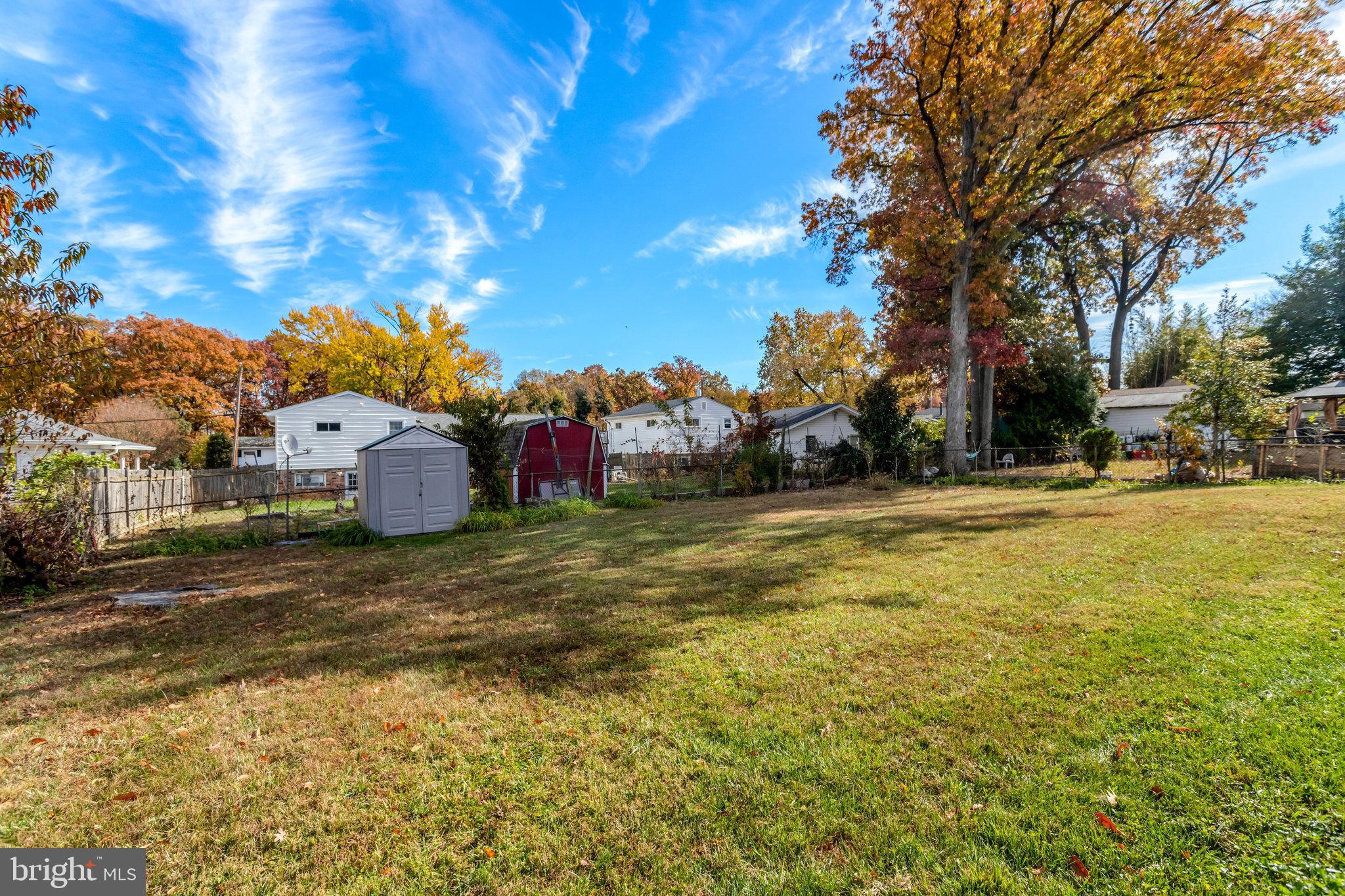 6928 Ruskin Street Springfield, VA 22150 - Photo 34 of 34 a front view of house with yard and trees